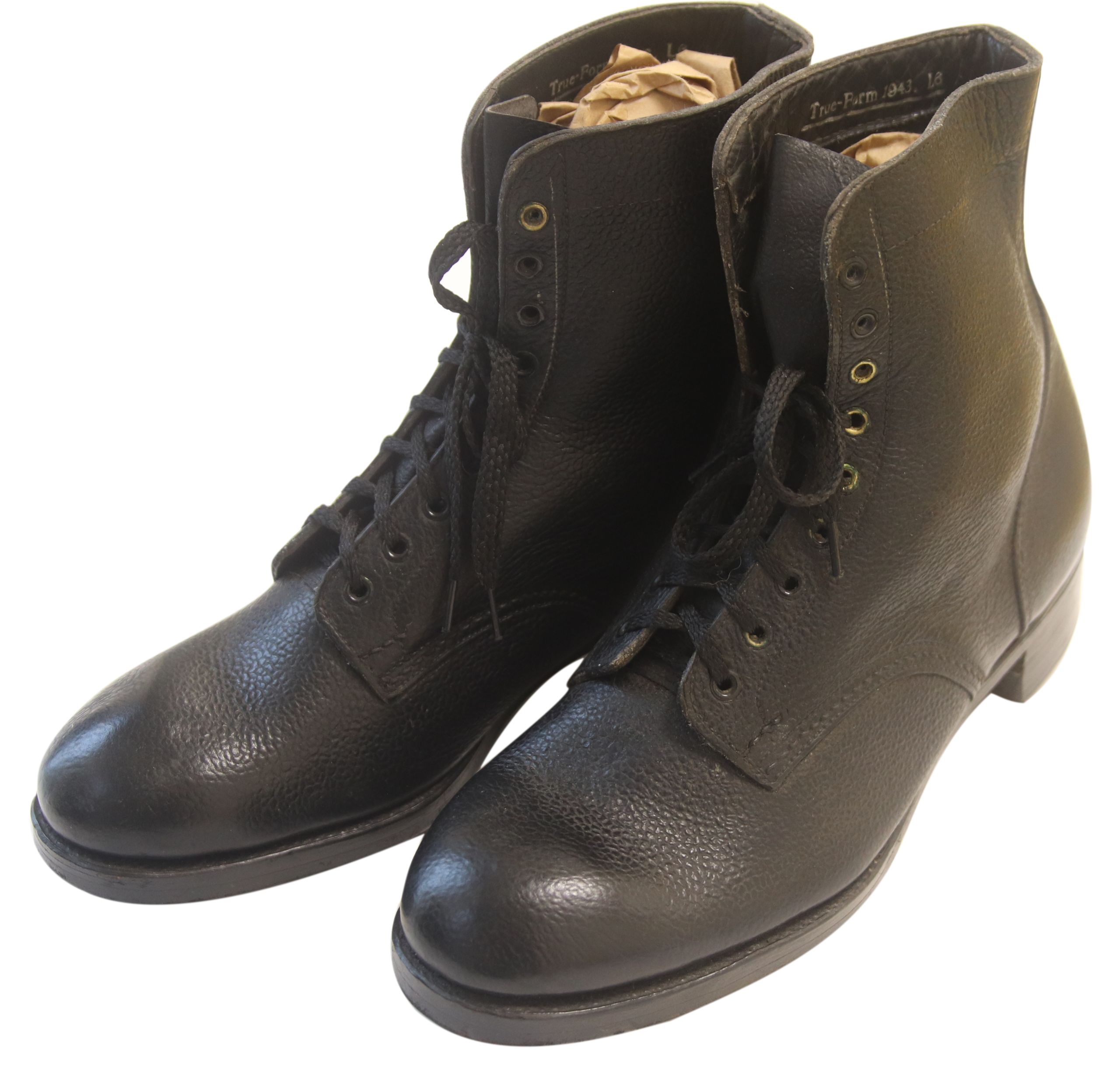 Colour photograph of a pair of very study looking black lace-up ankle boots.