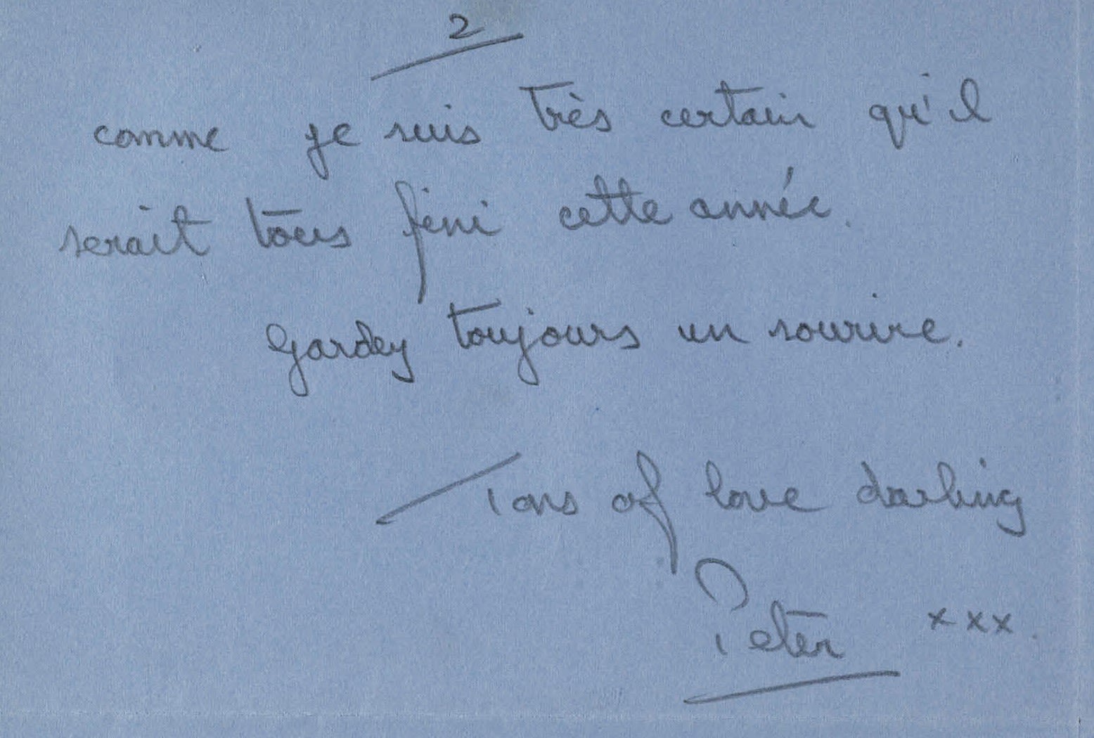 End of letter written on blue paper in French. The sign off is in English, Tons of love darling, Peter xxx