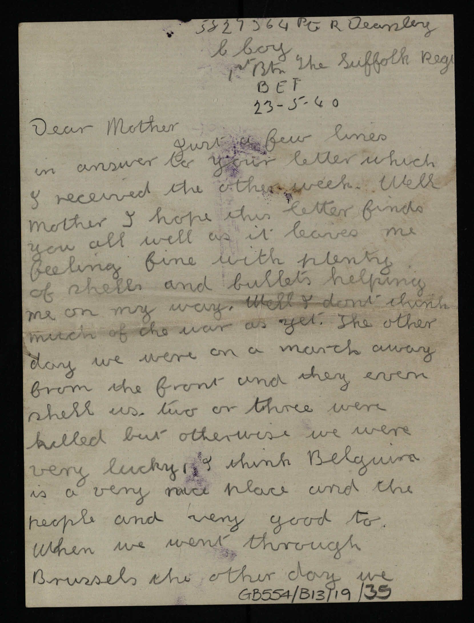 Handwritten letter in pencil on a small piece of unlined paper. Even though it is written in paper it has got some purple inky fingerprints on it.